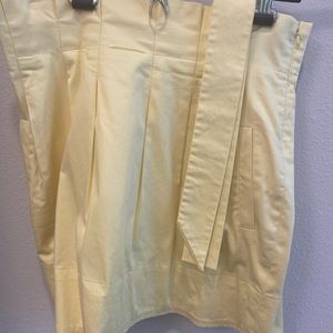 Pastel Yelllow BCBG pleated skirt with belt
